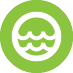 A green circular icon with a white symbol of wavy water in the middle, surrounded by a circle. The design symbolizes water, sustainability or environmentally friendly processes.